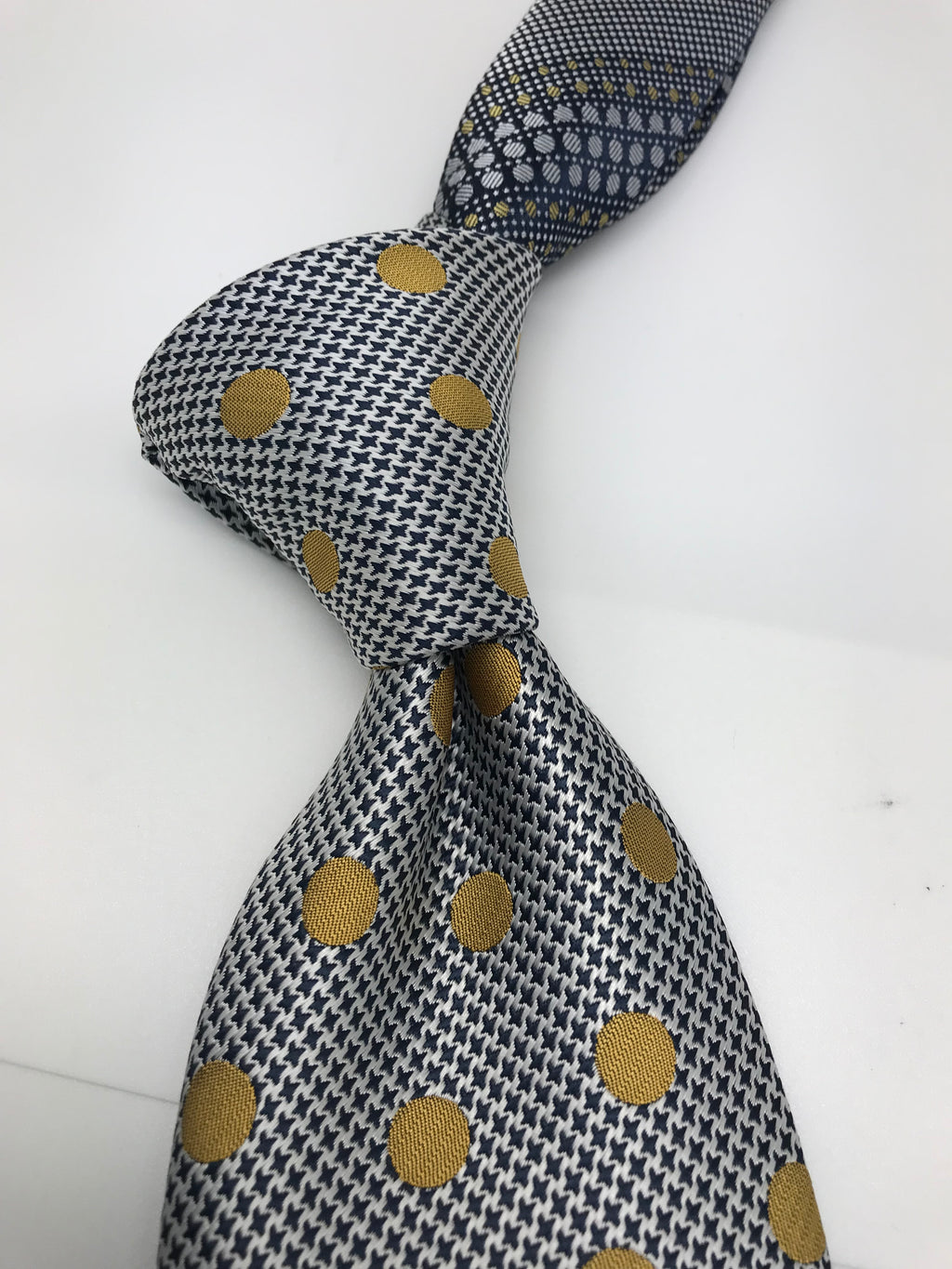 gold polka dot tie